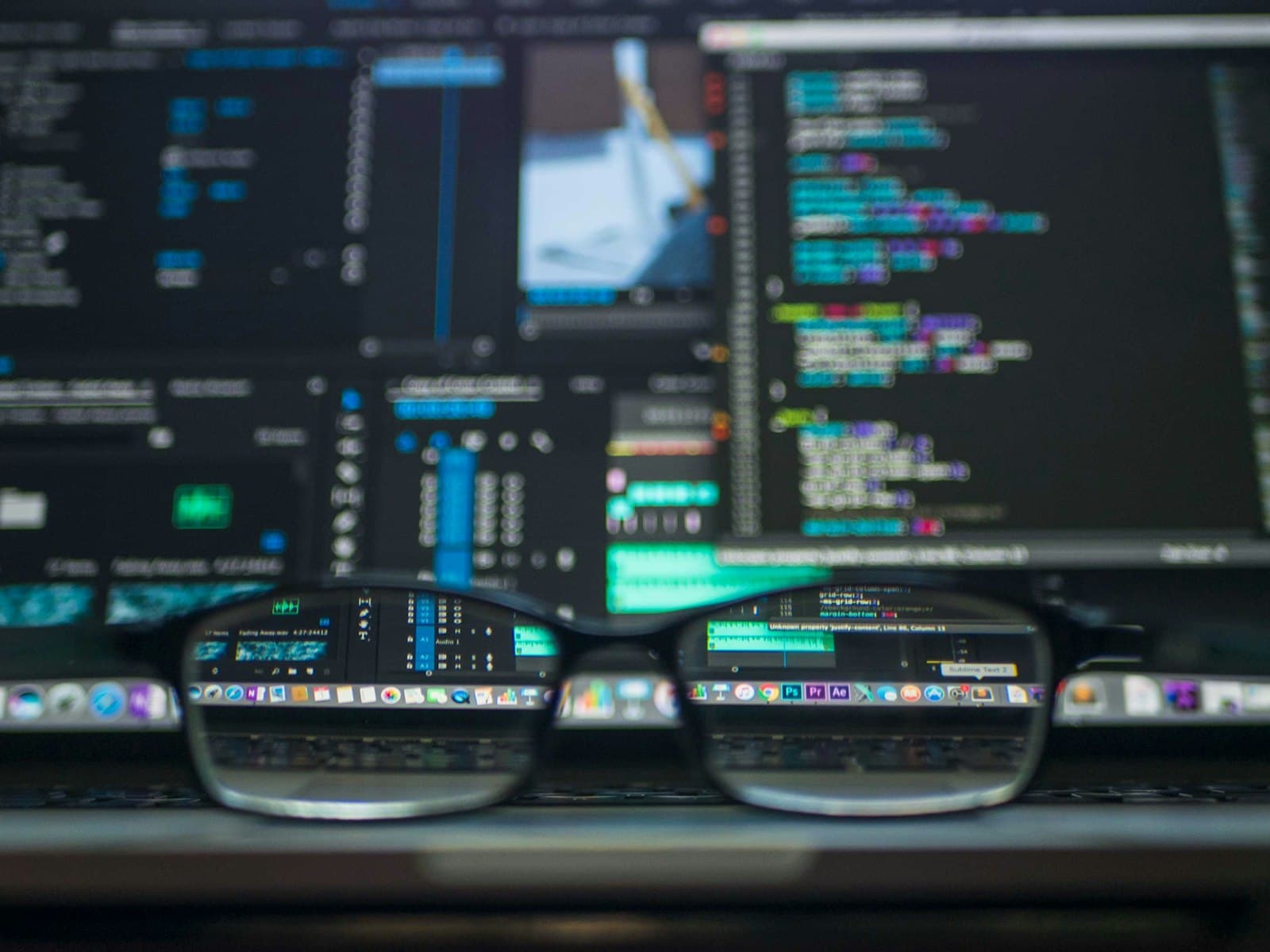 Monitoring dashboards and source code on an engineer's screens